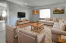 301 9 Street, Beiseker, AB  - Indoor Photo Showing Living Room 