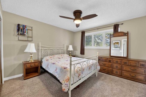 35 Queen Isabella Close Se, Calgary, AB - Indoor Photo Showing Bedroom