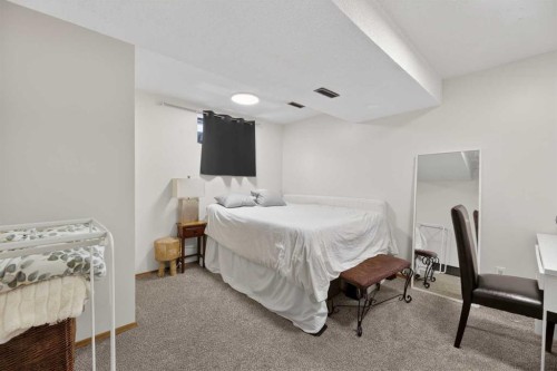 35 Queen Isabella Close Se, Calgary, AB - Indoor Photo Showing Bedroom