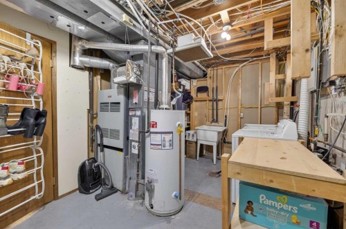 35 Queen Isabella Close Se, Calgary, AB - Indoor Photo Showing Basement