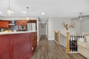 35 Queen Isabella Close Se, Calgary, AB  - Indoor Photo Showing Kitchen 