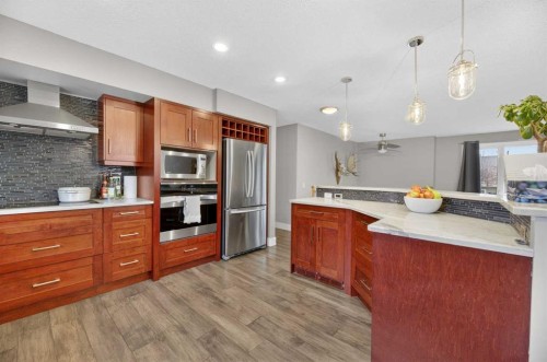 35 Queen Isabella Close Se, Calgary, AB - Indoor Photo Showing Kitchen With Upgraded Kitchen