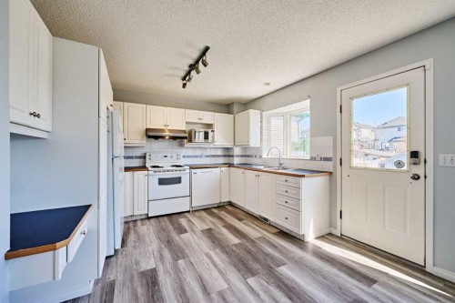 1085 Country Hills Circle Nw, Calgary, AB - Indoor Photo Showing Kitchen With Double Sink