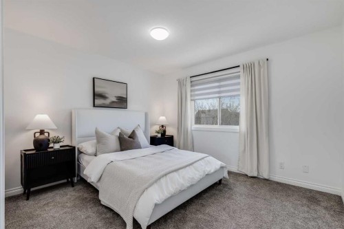 80 Canoe Square Sw, Airdrie, AB - Indoor Photo Showing Bedroom