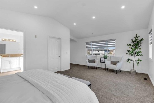 80 Canoe Square Sw, Airdrie, AB - Indoor Photo Showing Bedroom