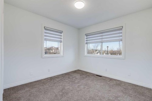 80 Canoe Square Sw, Airdrie, AB - Indoor Photo Showing Other Room