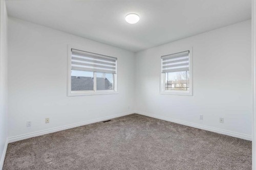 80 Canoe Square Sw, Airdrie, AB - Indoor Photo Showing Other Room