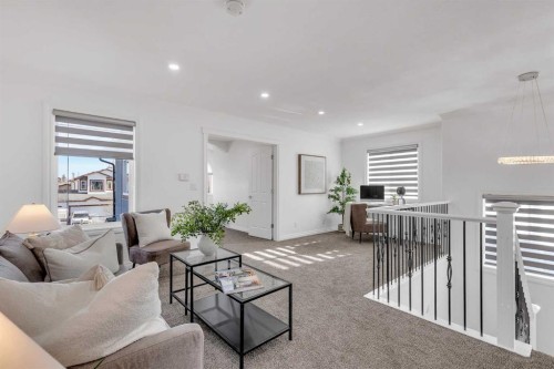 80 Canoe Square Sw, Airdrie, AB - Indoor Photo Showing Living Room
