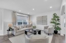 80 Canoe Square Sw, Airdrie, AB  - Indoor Photo Showing Living Room 
