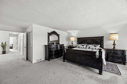 1360 Shawnee Road Sw, Calgary, AB - Indoor Photo Showing Bedroom