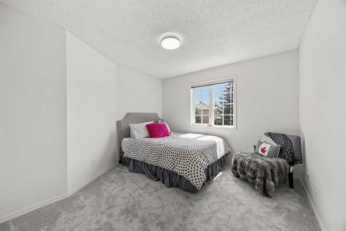 1360 Shawnee Road Sw, Calgary, AB - Indoor Photo Showing Bedroom