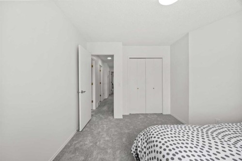 1360 Shawnee Road Sw, Calgary, AB - Indoor Photo Showing Bedroom