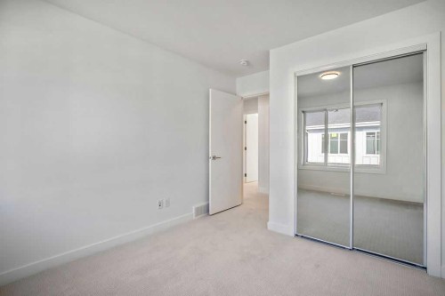 207-50 Cornerstone Passage Ne, Calgary, AB - Indoor Photo Showing Other Room