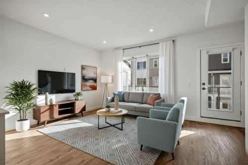 207-50 Cornerstone Passage Ne, Calgary, AB - Indoor Photo Showing Living Room