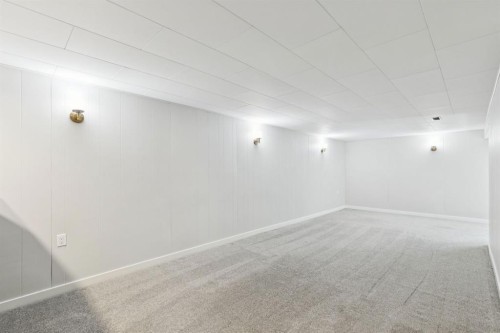 48 Haddock Road Sw, Calgary, AB - Indoor Photo Showing Other Room