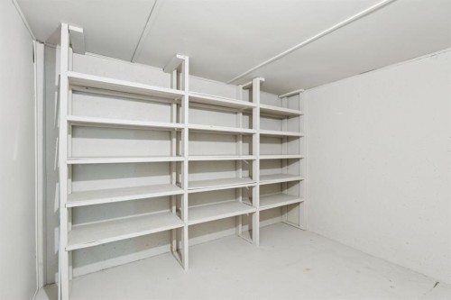 48 Haddock Road Sw, Calgary, AB - Indoor With Storage