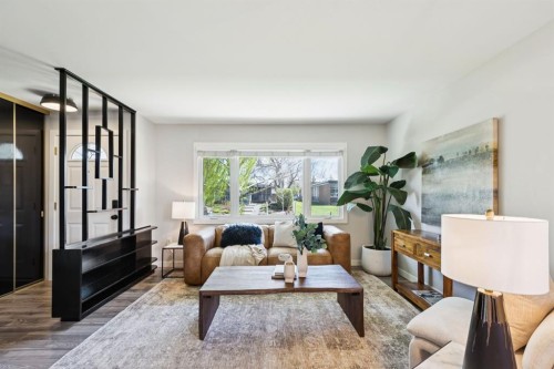 48 Haddock Road Sw, Calgary, AB - Indoor Photo Showing Living Room
