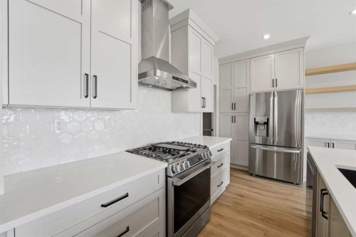 8 Tipping Avenue, Red Deer, AB - Indoor Photo Showing Kitchen With Stainless Steel Kitchen With Upgraded Kitchen