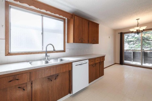 5222 Dalhousie Drive Nw, Calgary, AB - Indoor Photo Showing Kitchen With Double Sink