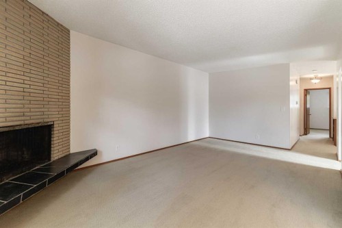 5222 Dalhousie Drive Nw, Calgary, AB - Indoor With Fireplace