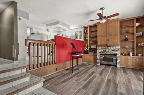 740 Canfield Place Sw, Calgary, AB - Indoor With Fireplace