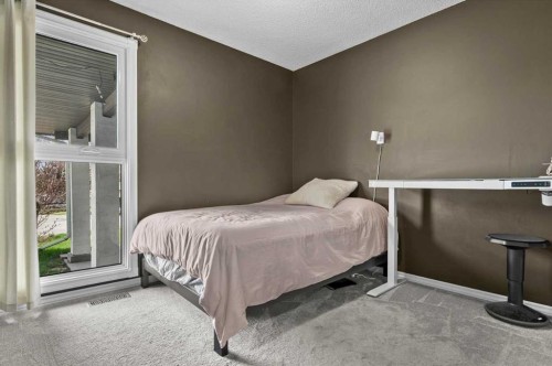 740 Canfield Place Sw, Calgary, AB - Indoor Photo Showing Bedroom
