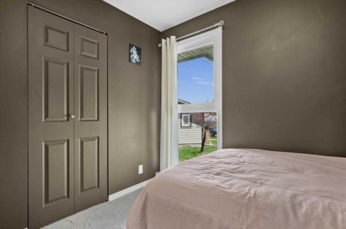 740 Canfield Place Sw, Calgary, AB - Indoor Photo Showing Bedroom