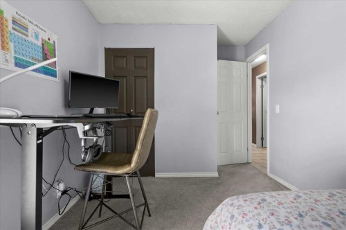 740 Canfield Place Sw, Calgary, AB - Indoor Photo Showing Bedroom