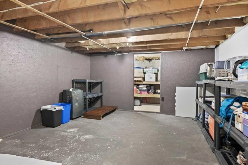740 Canfield Place Sw, Calgary, AB - Indoor Photo Showing Basement
