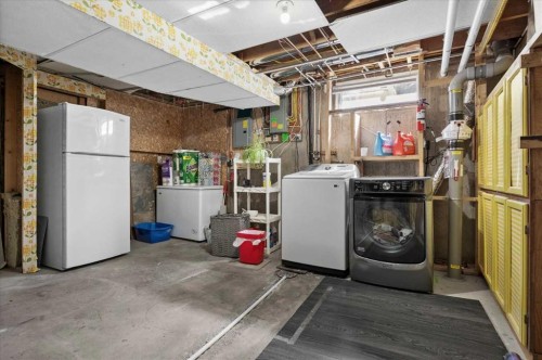 740 Canfield Place Sw, Calgary, AB - Indoor Photo Showing Laundry Room