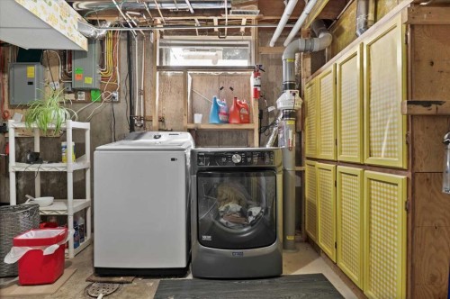 740 Canfield Place Sw, Calgary, AB - Indoor Photo Showing Laundry Room