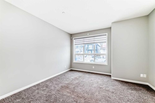 148 Howse Avenue Ne, Calgary, AB - Indoor Photo Showing Other Room