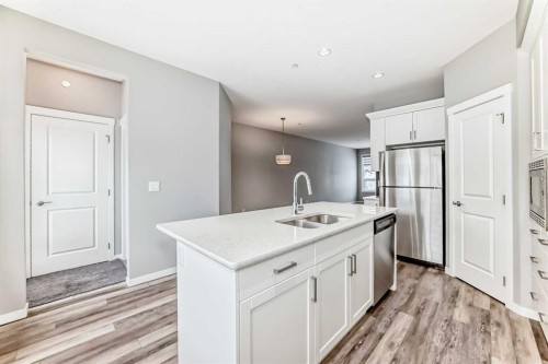148 Howse Avenue Ne, Calgary, AB - Indoor Photo Showing Kitchen With Double Sink