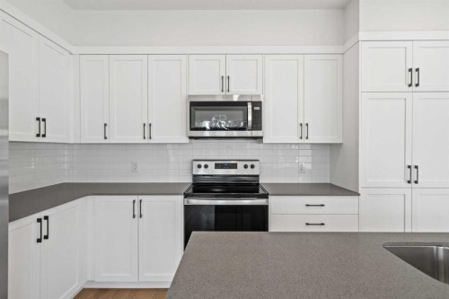 79 Eston Lane Se, Calgary, AB - Indoor Photo Showing Kitchen