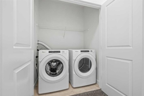 79 Eston Lane Se, Calgary, AB - Indoor Photo Showing Laundry Room