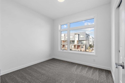 79 Eston Lane Se, Calgary, AB - Indoor Photo Showing Other Room