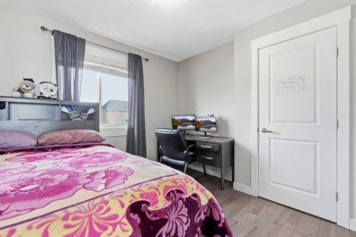 161 Rainbow Falls Glen, Chestermere, AB - Indoor Photo Showing Bedroom