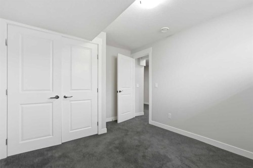 161 Rainbow Falls Glen, Chestermere, AB - Indoor Photo Showing Other Room