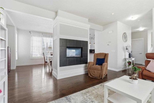 161 Rainbow Falls Glen, Chestermere, AB - Indoor Photo Showing Living Room With Fireplace