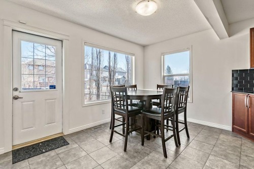 30 Drake Landing Common, Okotoks, AB - Indoor Photo Showing Dining Room