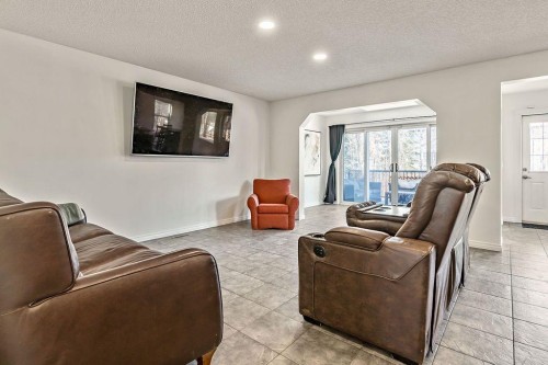 30 Drake Landing Common, Okotoks, AB - Indoor Photo Showing Living Room
