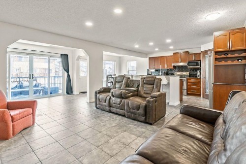 30 Drake Landing Common, Okotoks, AB - Indoor Photo Showing Living Room