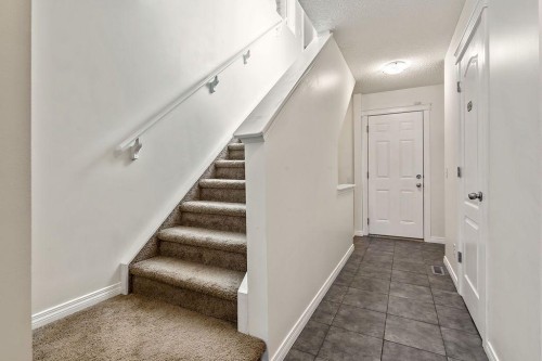30 Drake Landing Common, Okotoks, AB - Indoor Photo Showing Other Room