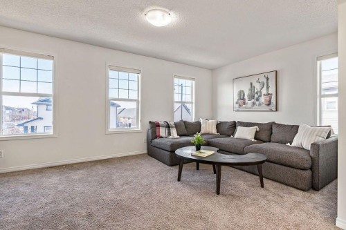 30 Drake Landing Common, Okotoks, AB - Indoor Photo Showing Living Room
