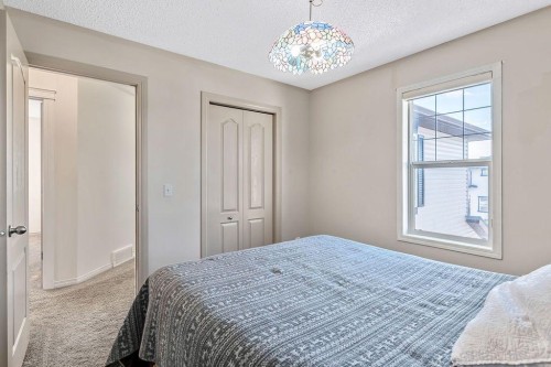 30 Drake Landing Common, Okotoks, AB - Indoor Photo Showing Bedroom