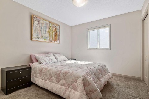 30 Drake Landing Common, Okotoks, AB - Indoor Photo Showing Bedroom