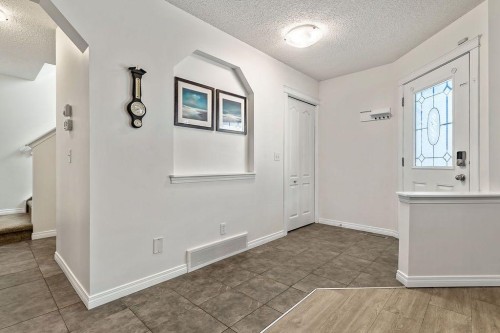 30 Drake Landing Common, Okotoks, AB - Indoor Photo Showing Other Room