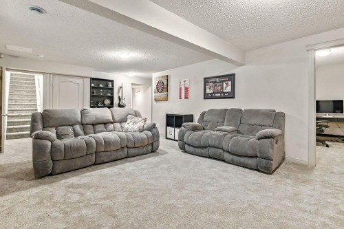 30 Drake Landing Common, Okotoks, AB - Indoor Photo Showing Living Room