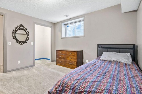 30 Drake Landing Common, Okotoks, AB - Indoor Photo Showing Bedroom