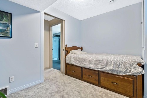 30 Drake Landing Common, Okotoks, AB - Indoor Photo Showing Bedroom